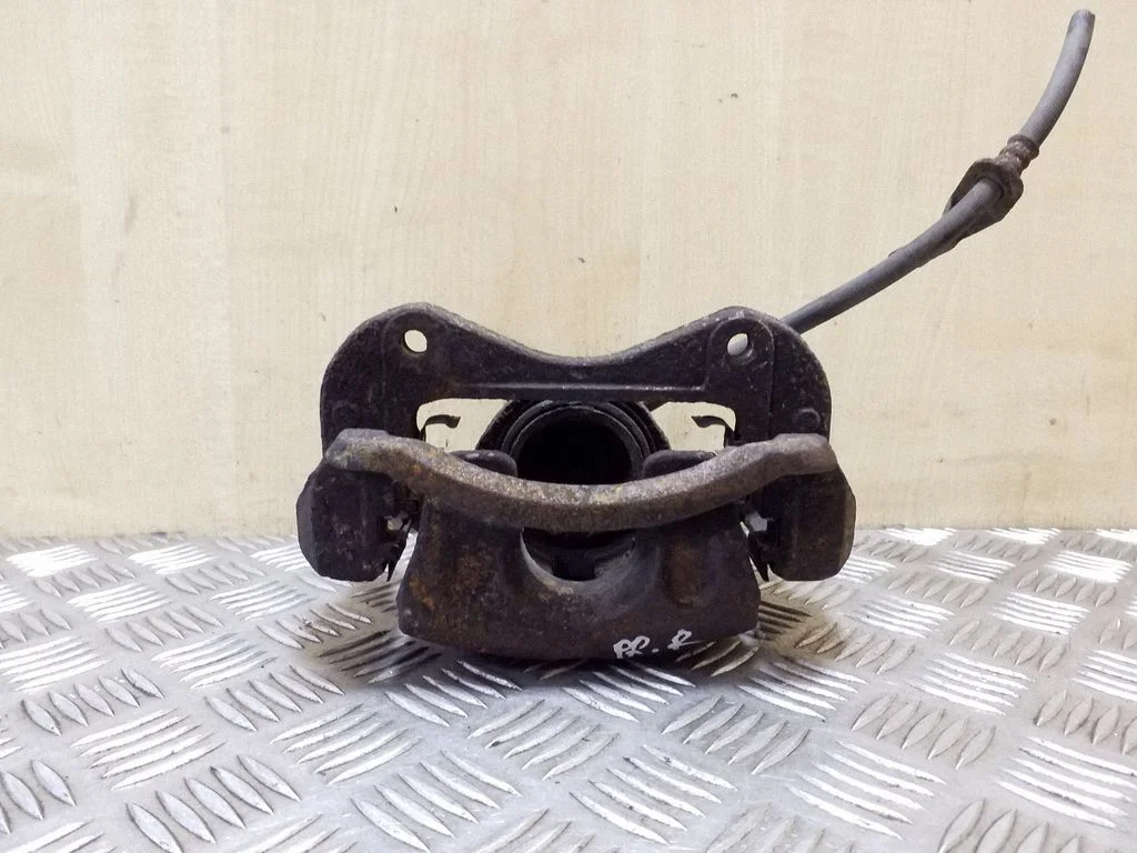 Front brake caliper – right