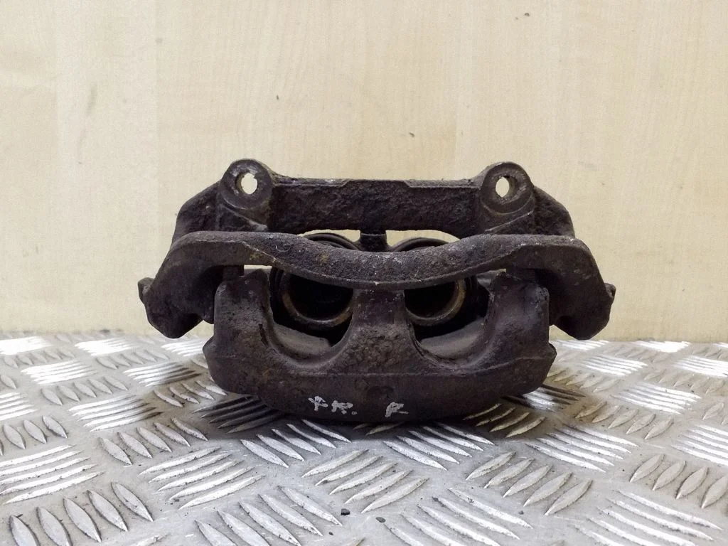 Front brake caliper – right