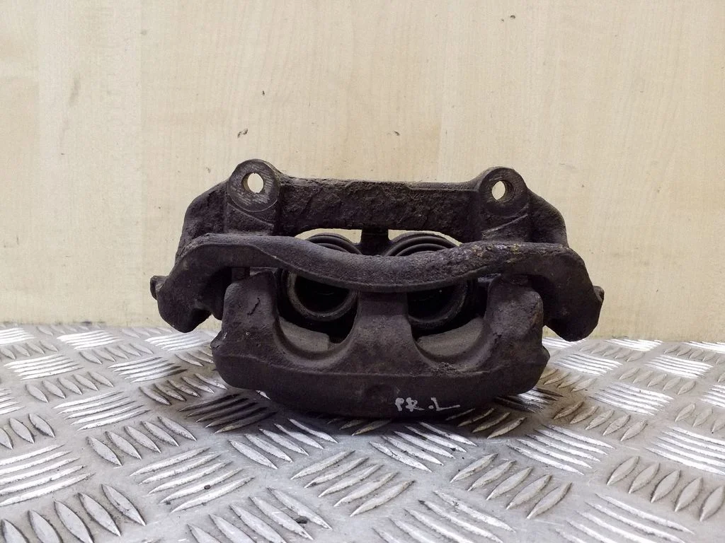 Front brake caliper – left