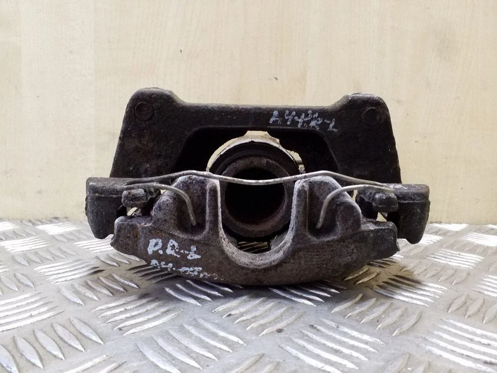 Front brake caliper – left