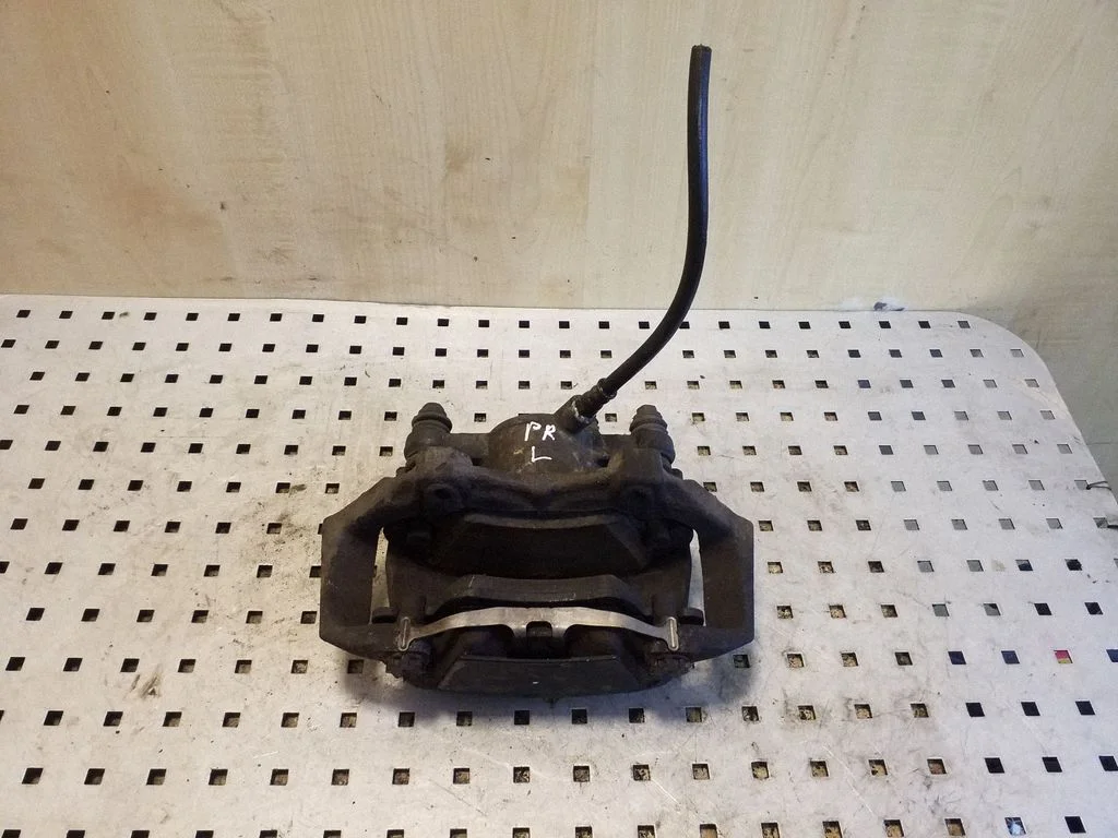 Front brake caliper – left