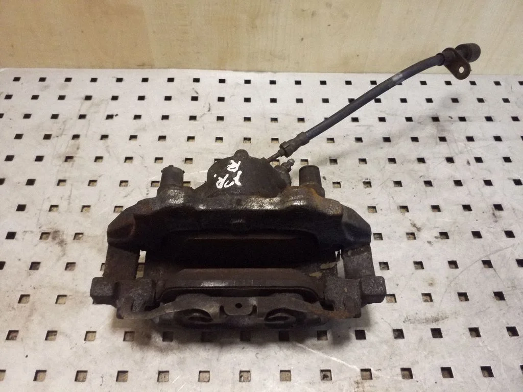 Front brake caliper – right