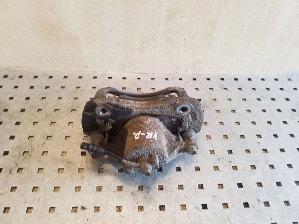 Front brake caliper – right