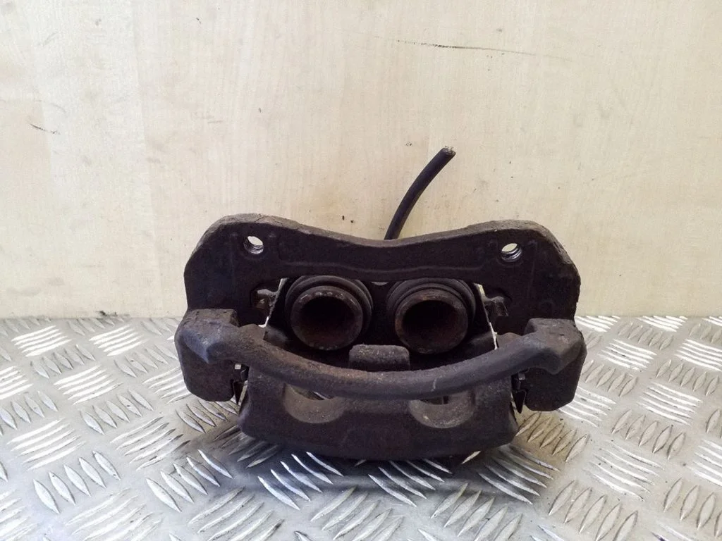 Front brake caliper – right