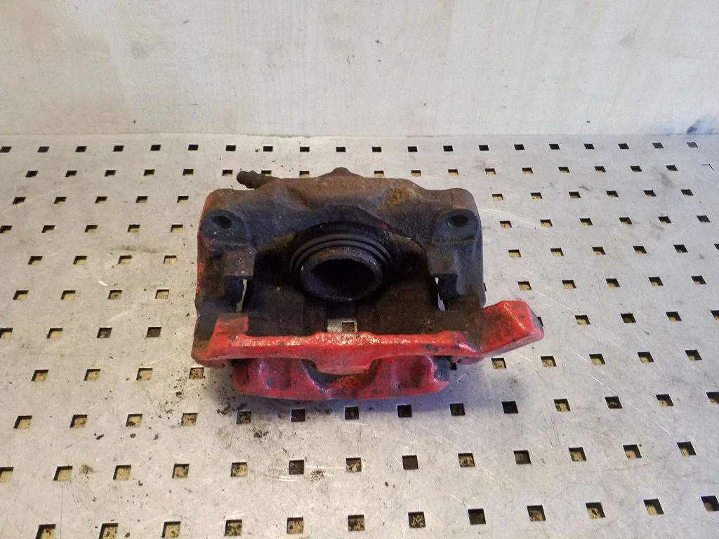 Front brake caliper – Renault Scenic I (1996-2003), left