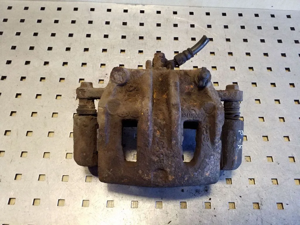 Front brake caliper – right