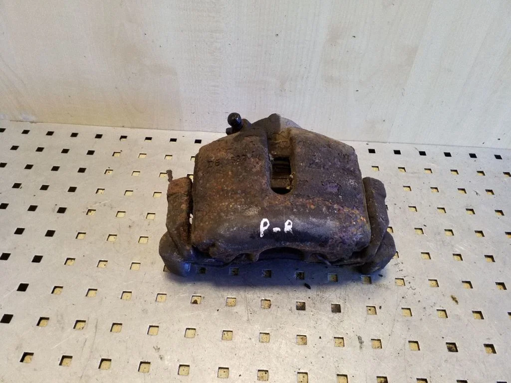 Front brake caliper – right