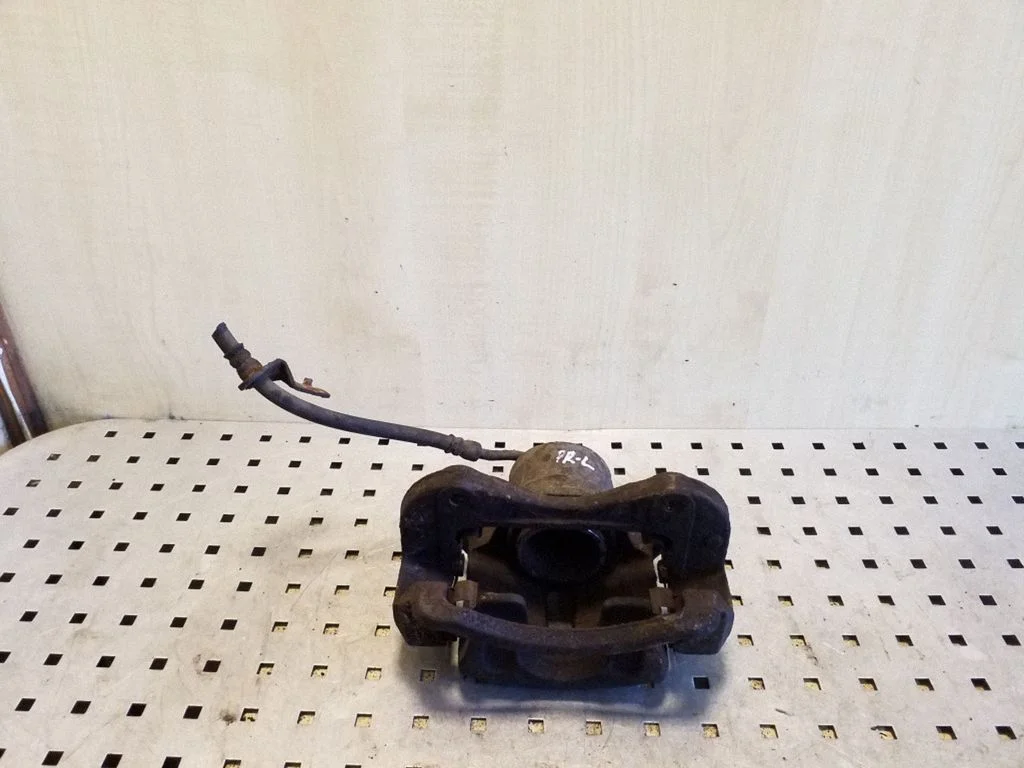 Front brake caliper – left