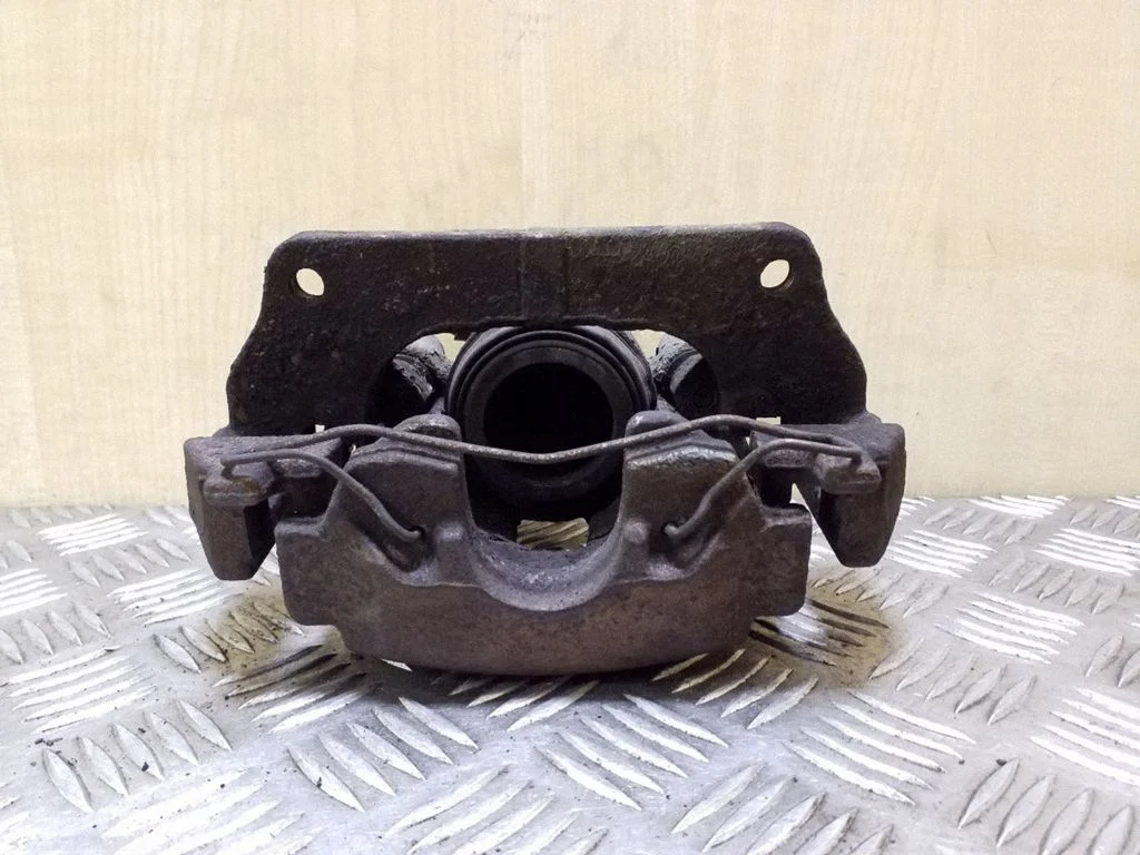 Front brake caliper – left