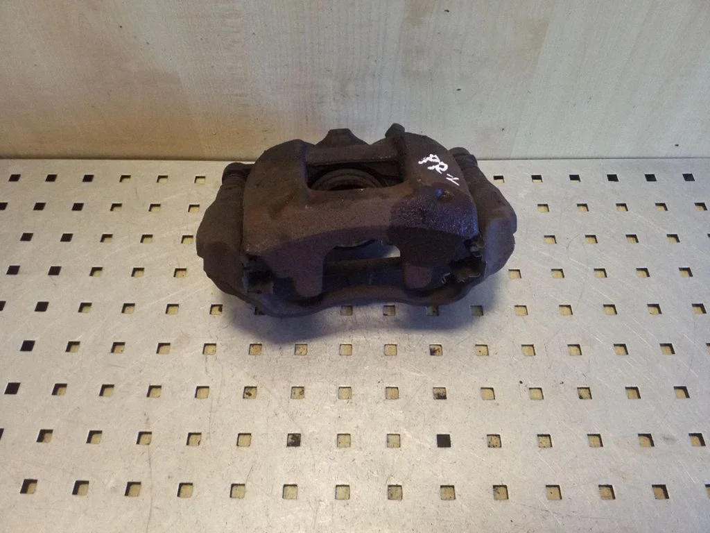 Front brake caliper – left