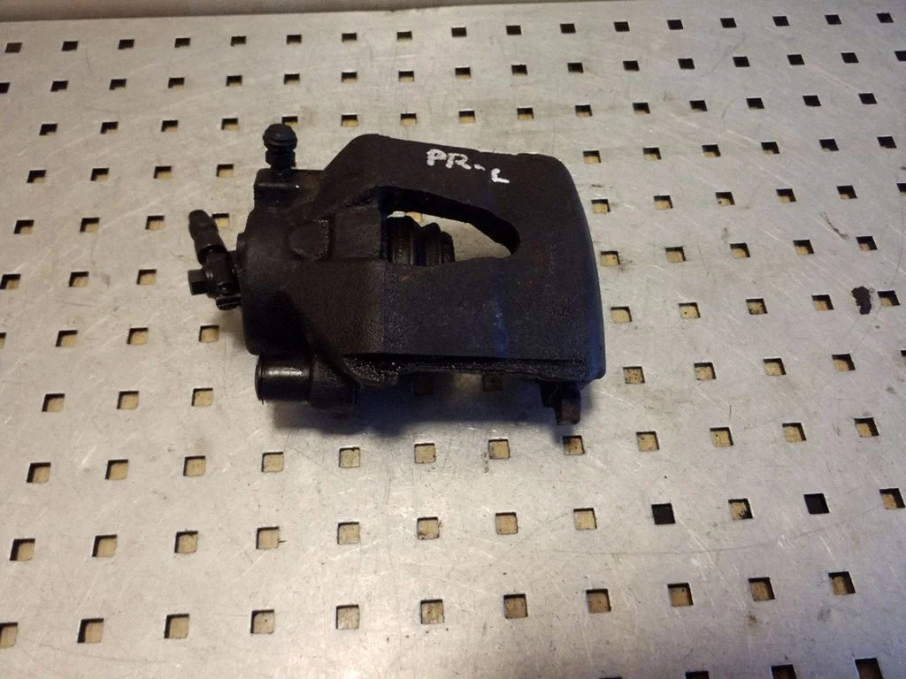 Front brake caliper – left
