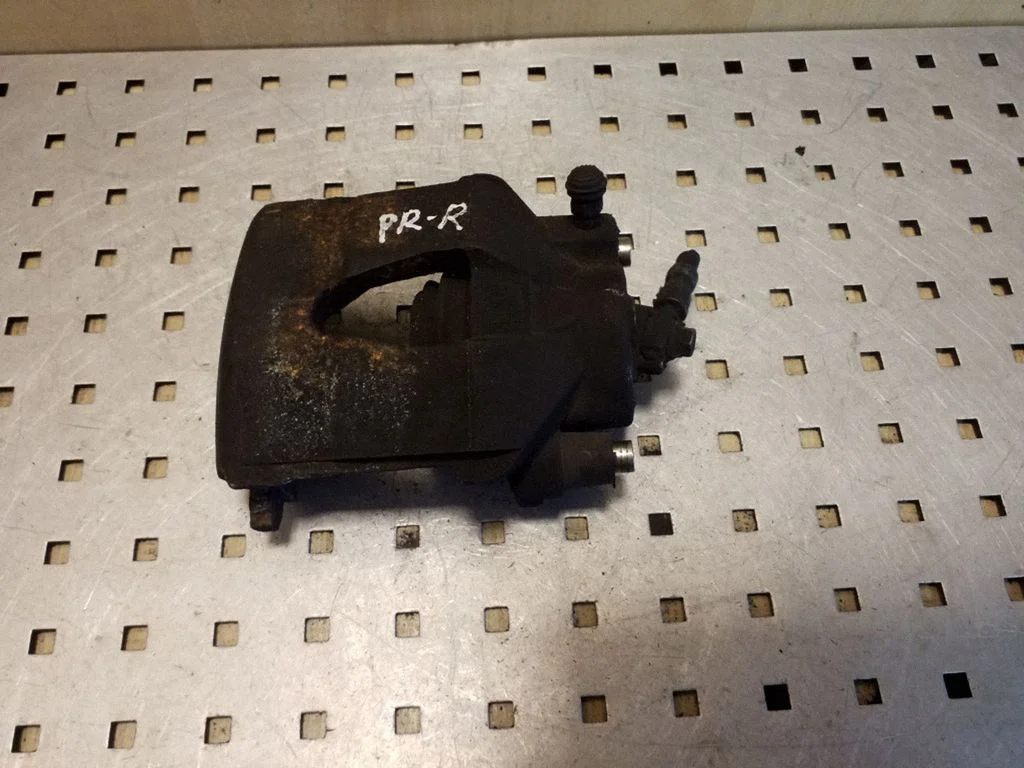 Front brake caliper – right