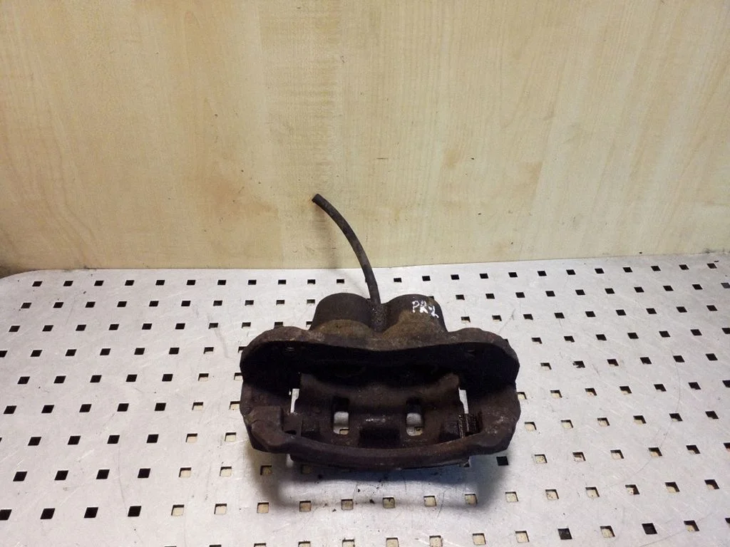 Front brake caliper – left
