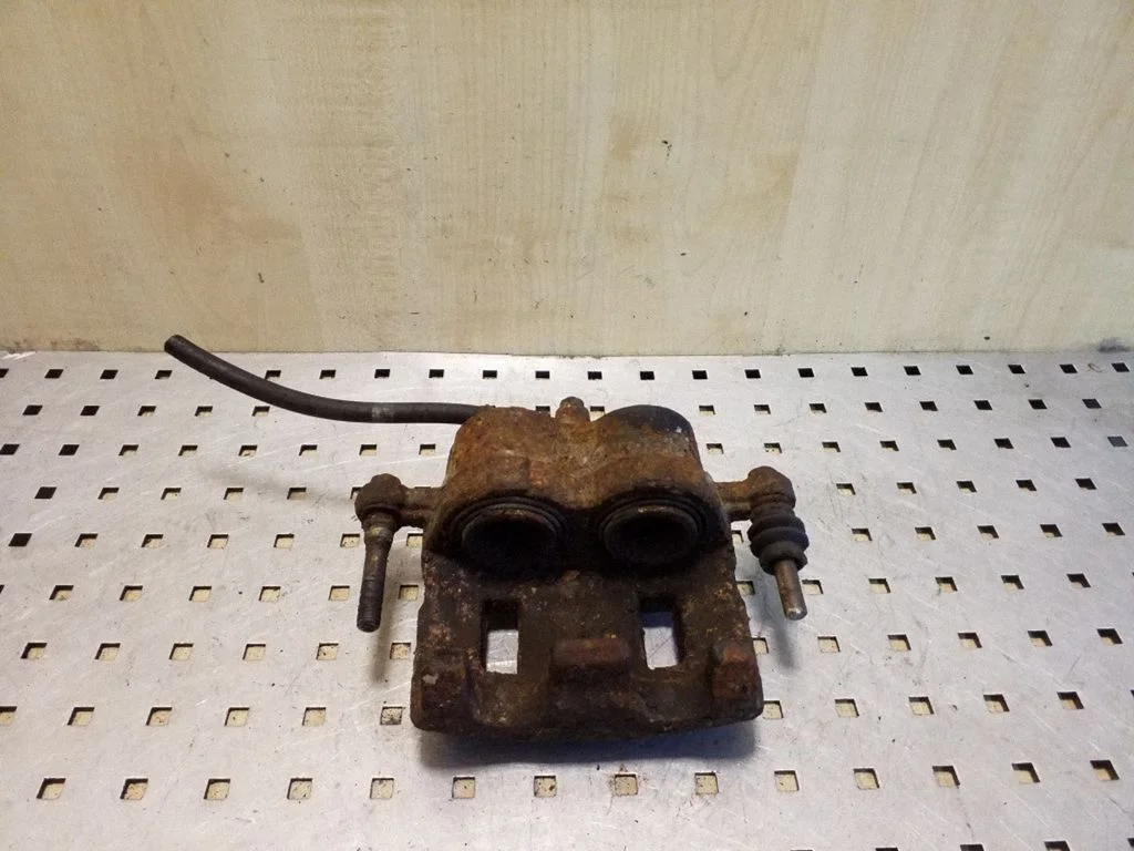 Front brake caliper – left