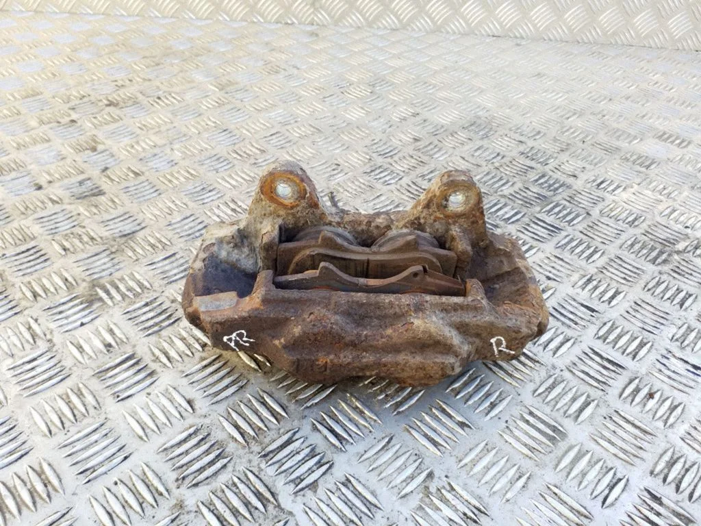Front brake caliper – right