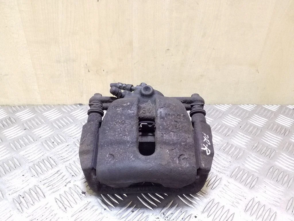 Front brake caliper – right