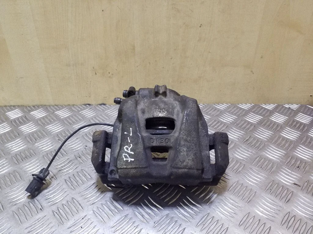 Front brake caliper – left