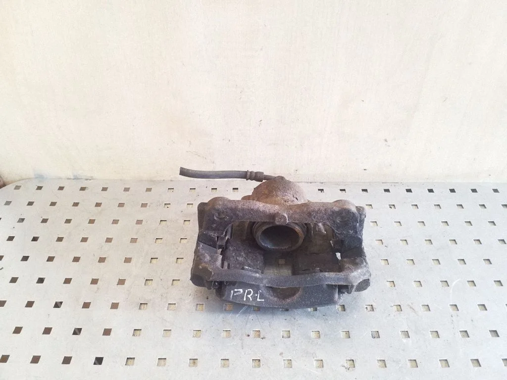 Front brake caliper – left