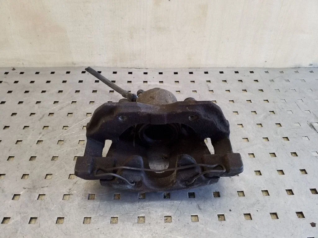 Front brake caliper – Ford Focus (2010-2017), left