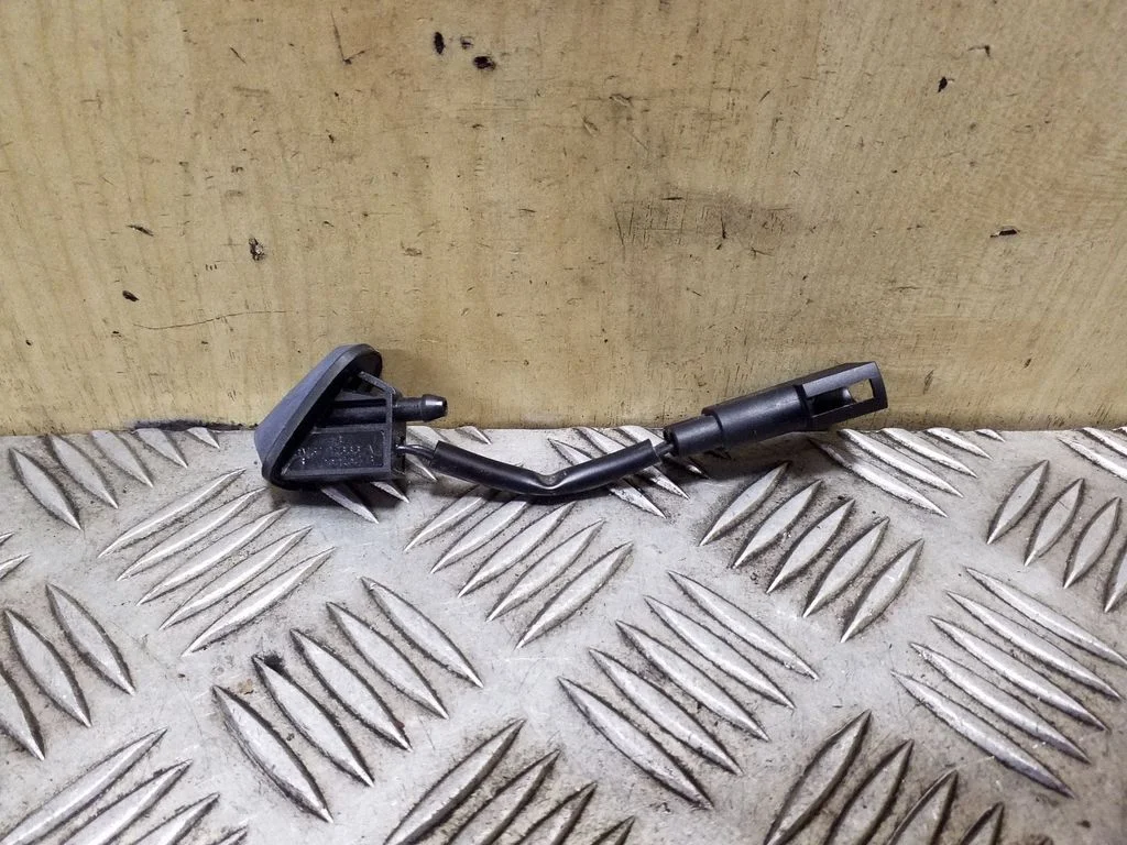 Windshield washer spray nozzle BM5117666A – Ford Focus (2010-2017)