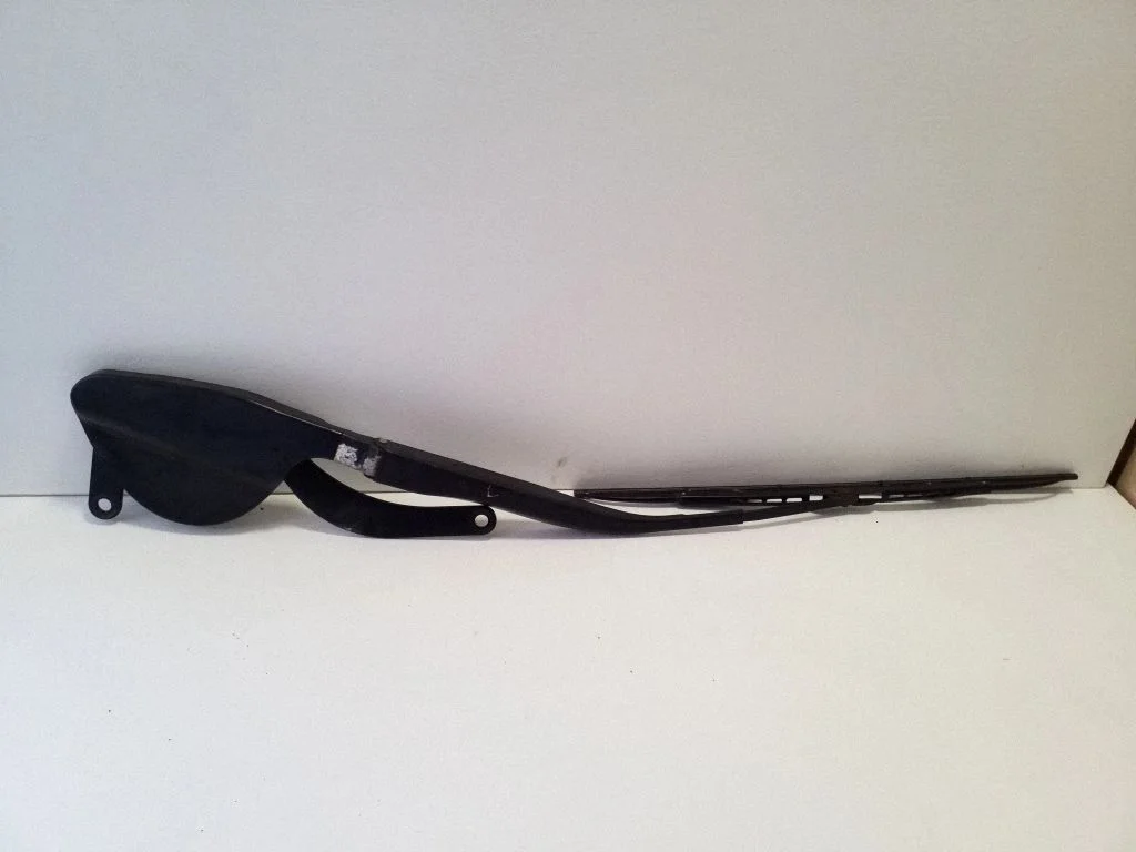 Front wiper blade arm – left