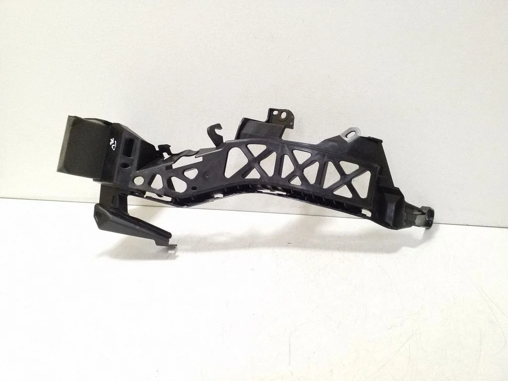 Headlight/headlamp mounting bracket 57707FN000