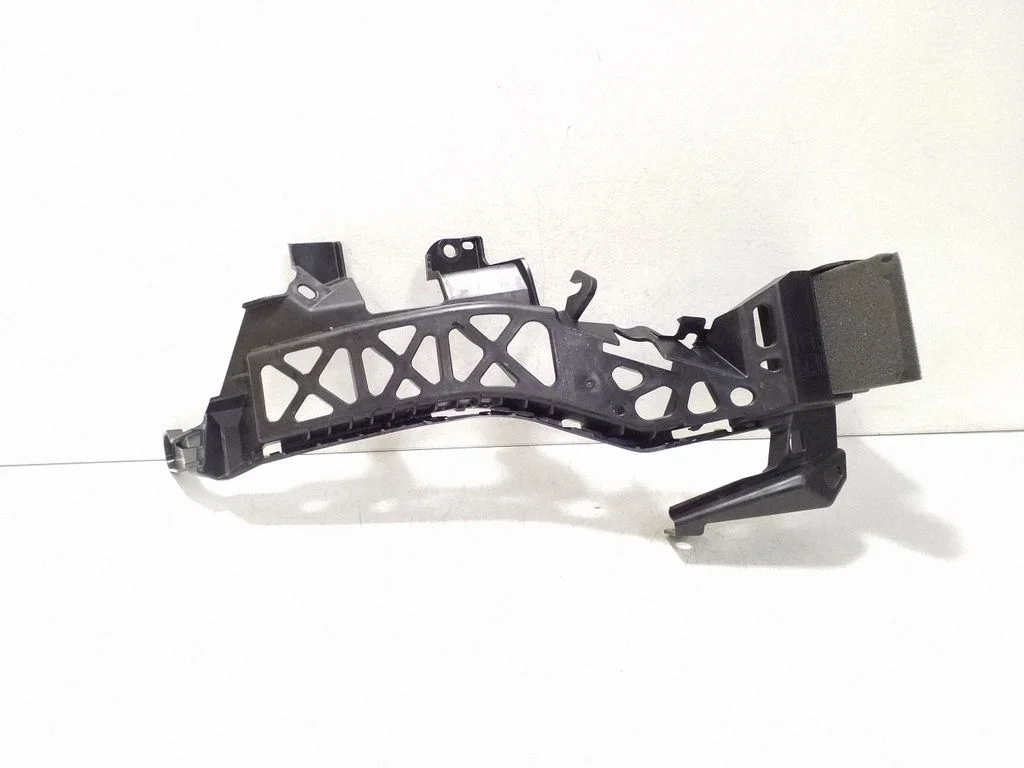 Headlight/headlamp mounting bracket 57707FN010