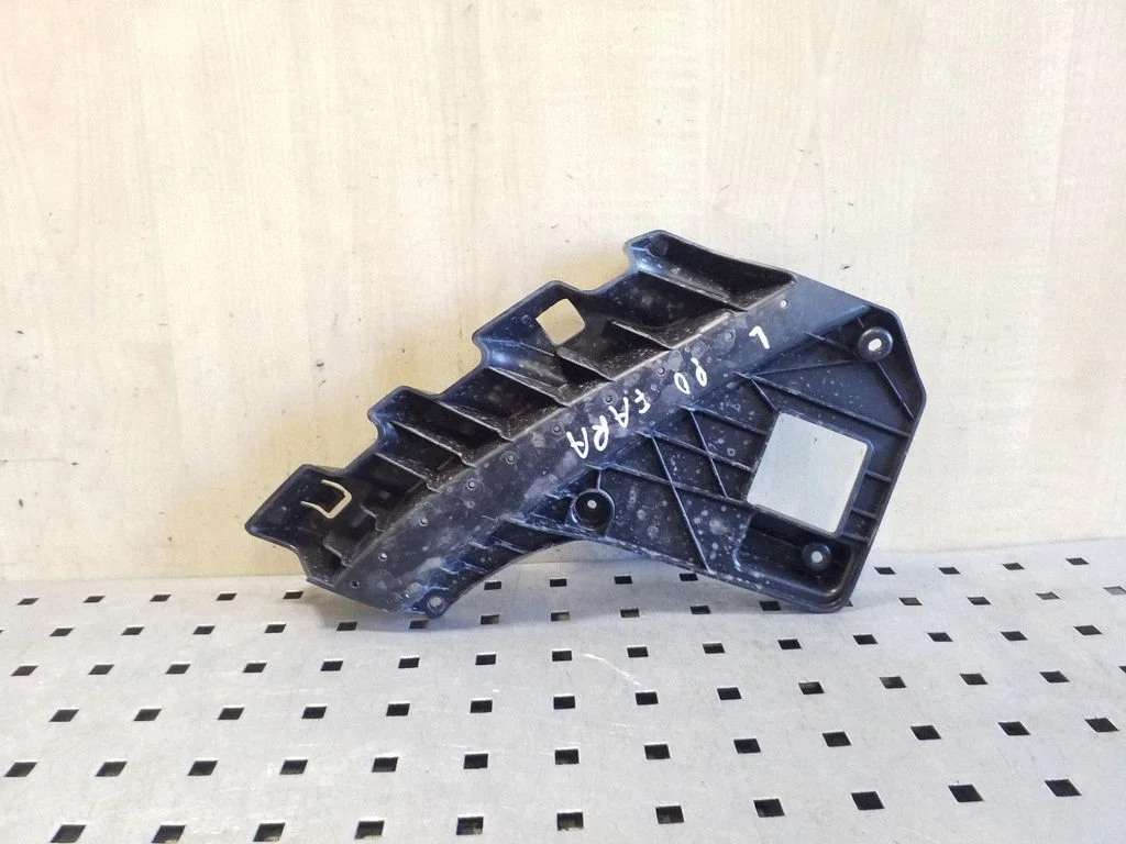 Headlight/headlamp mounting bracket – Tesla Model Y (2020-), left