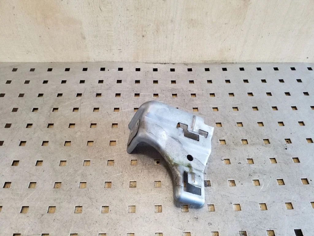 Headlight/headlamp mounting bracket – Toyota Corolla E120 E130 (2004-2007)