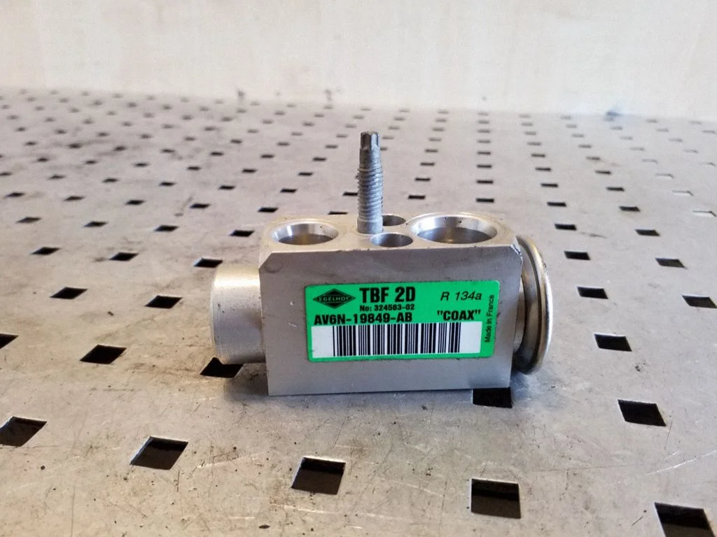 Air conditioning (A/C) expansion valve AV6N19849AB