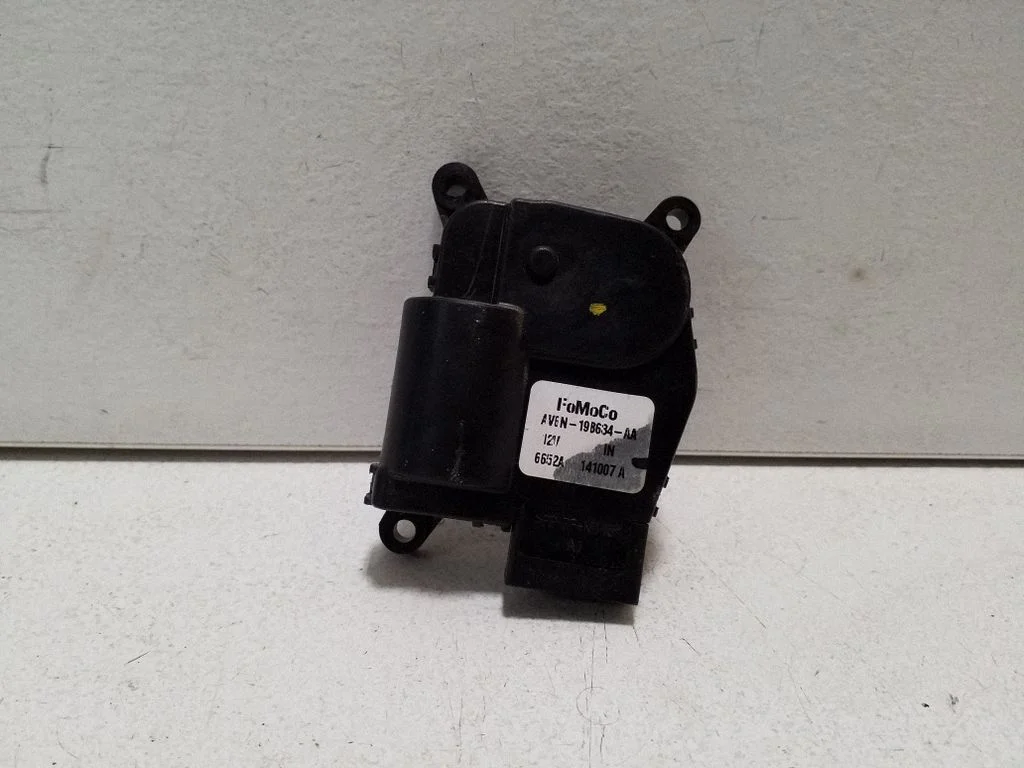 Air flap motor/actuator AV6N19B634AA