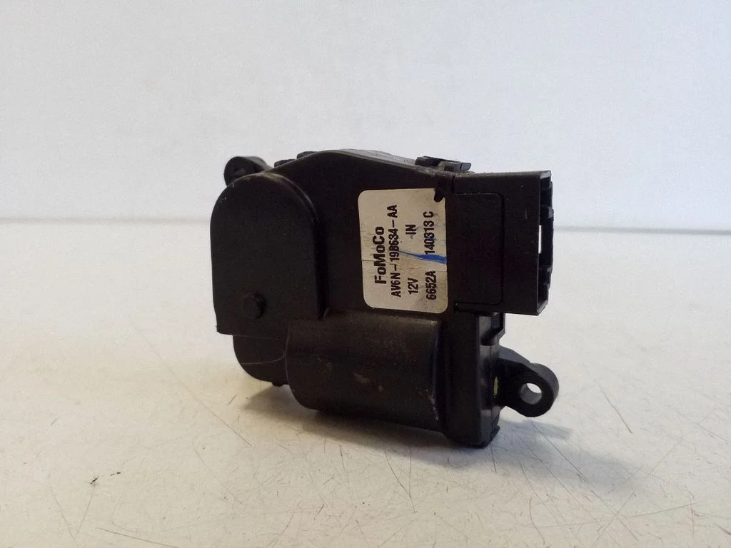 Air flap motor/actuator AV6N19B634AA