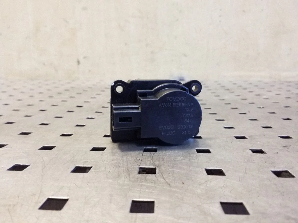 Air flap motor/actuator AV6N19E616AA