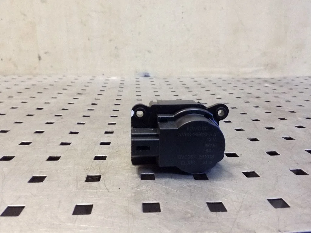Air flap motor/actuator AV6N19E616AA