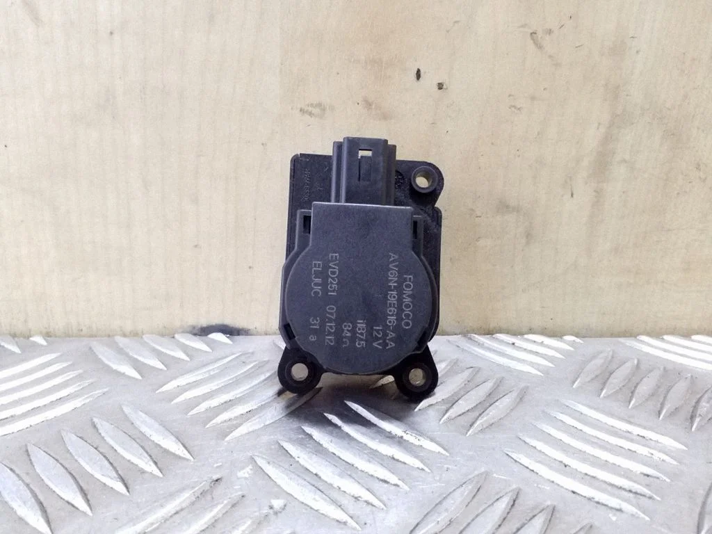 Air flap motor/actuator AV6N19E616AA
