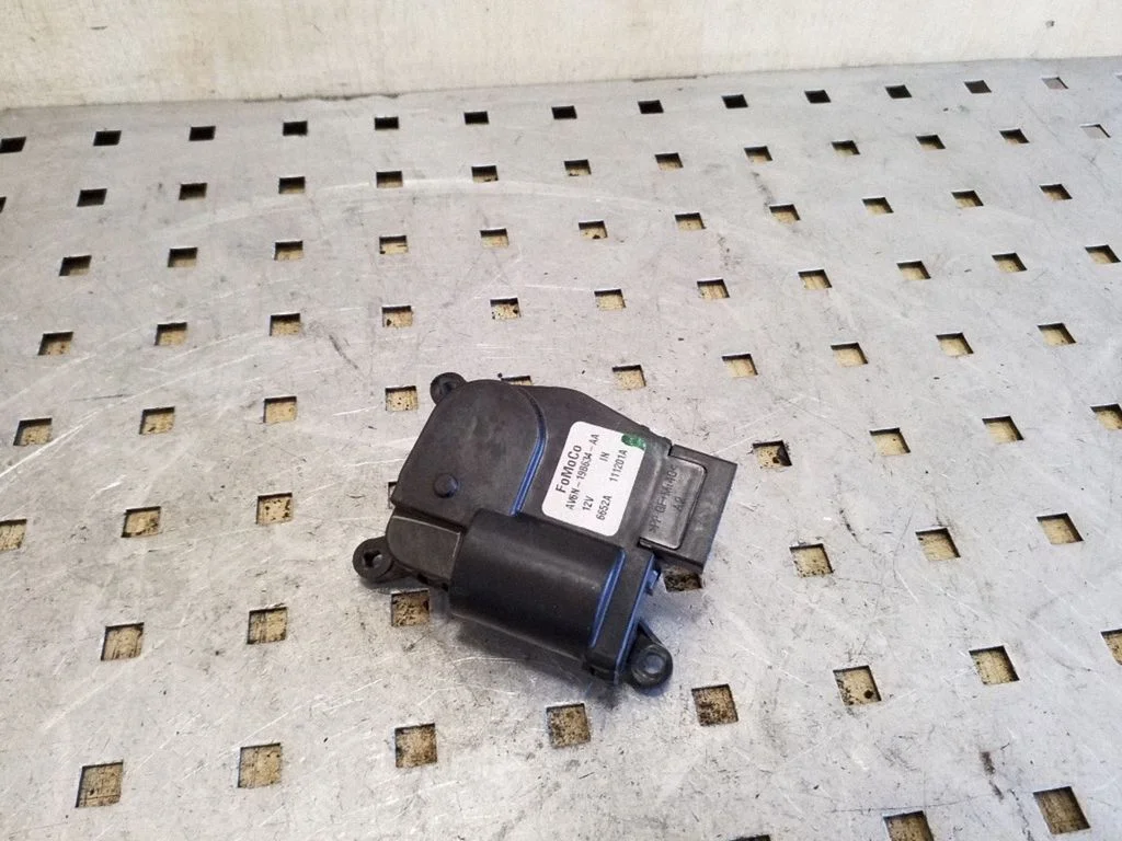 Air flap motor/actuator AV6N19B634AA
