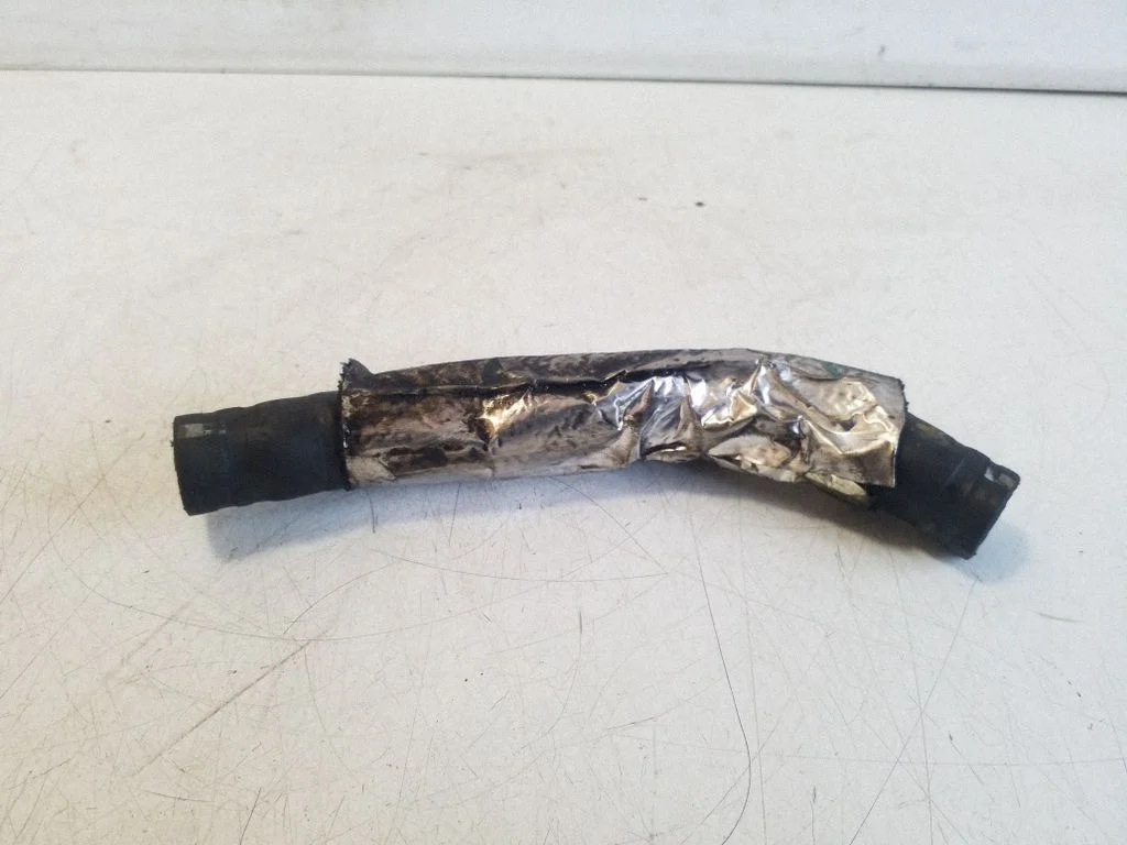 Engine coolant pipe/hose