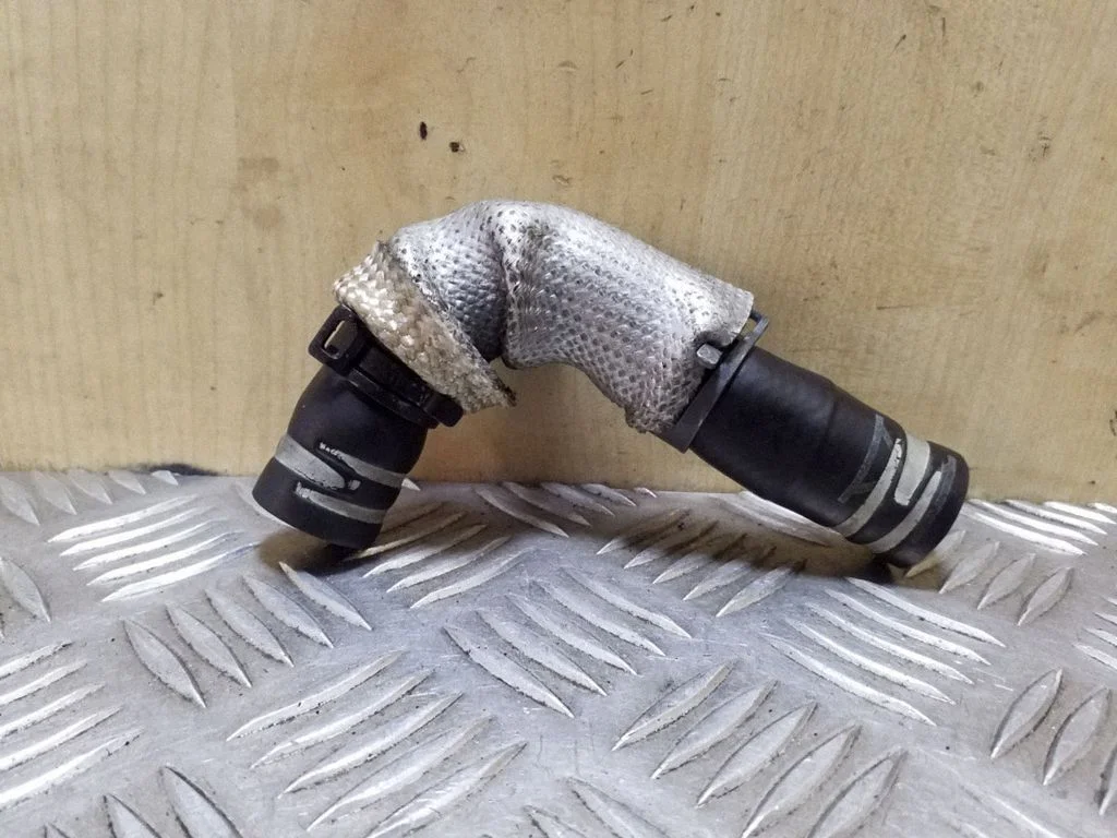 Engine coolant pipe/hose