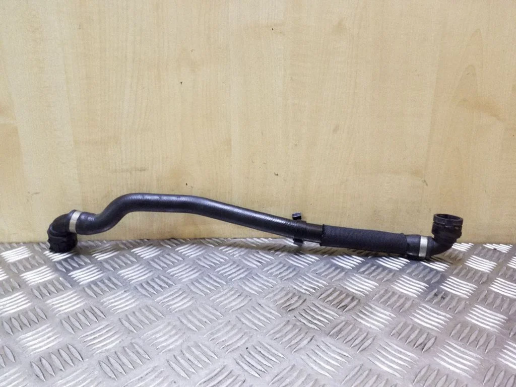 Engine coolant pipe/hose