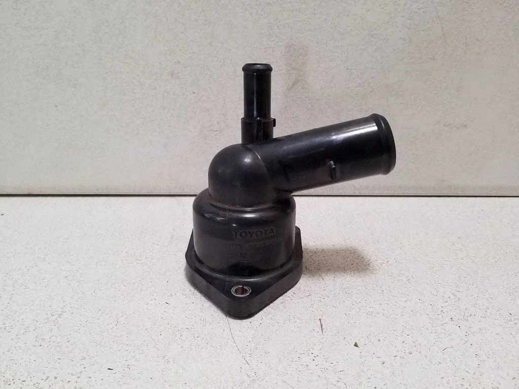 Thermostat/thermostat housing