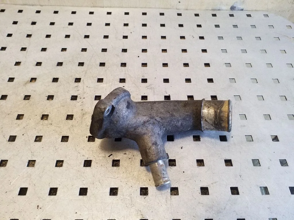 Thermostat/thermostat housing