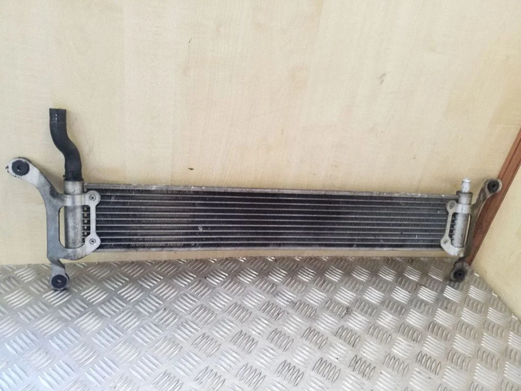 Jahutusvedeliku radiaator 7L6121212B
