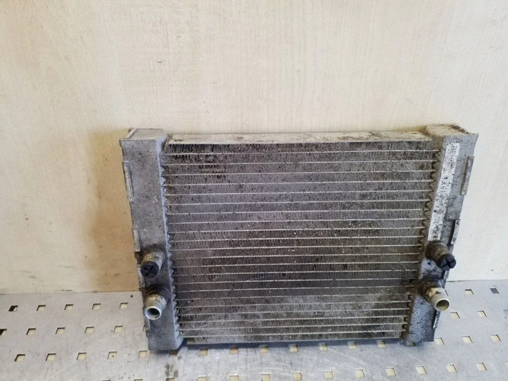 Coolant radiator 7533477