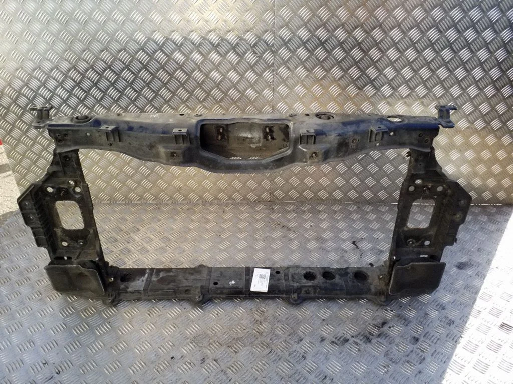 Radiator support slam panel