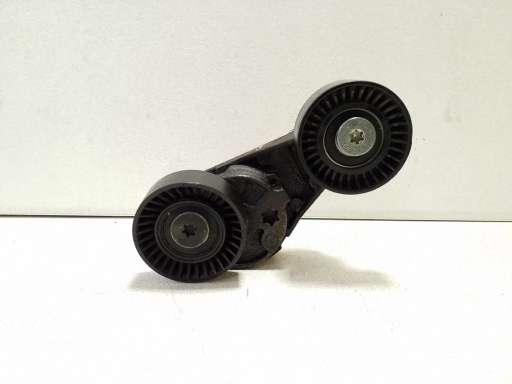 Generator/alternator belt tensioner