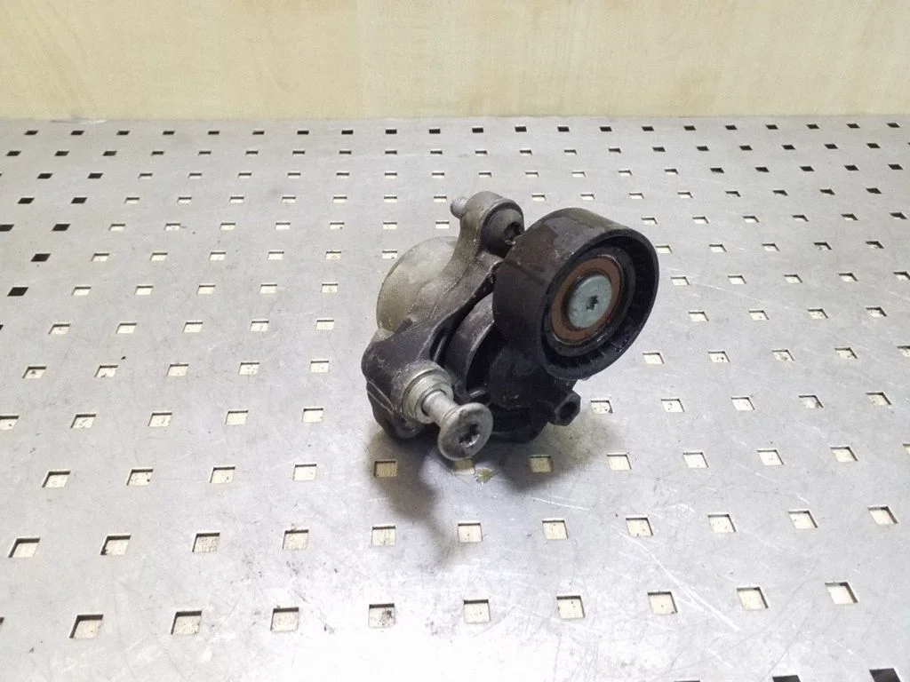 Generator/alternator belt tensioner