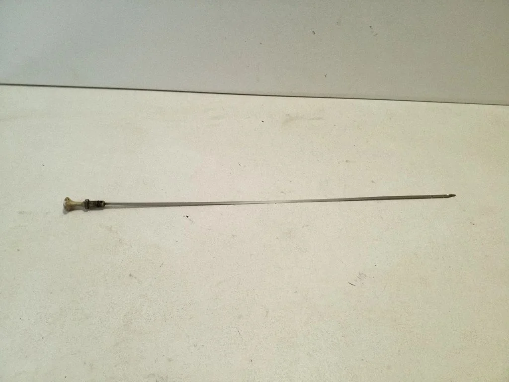 Oil level dip stick