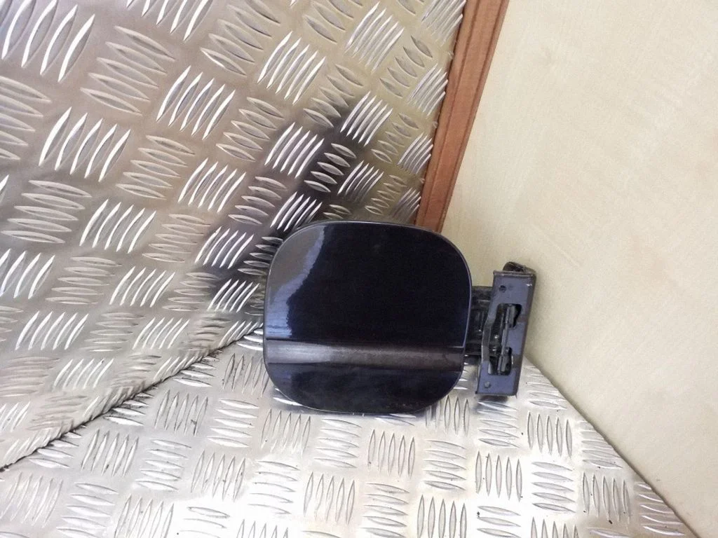 Fuel tank cap lock