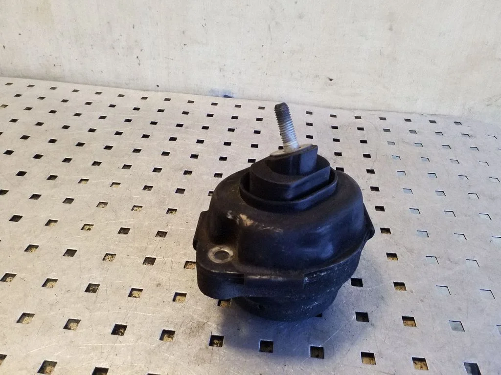 Engine mount bracket – right