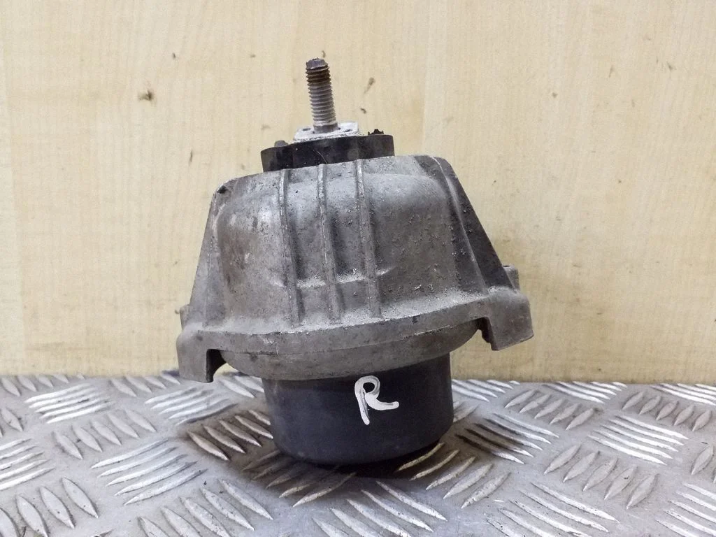 Engine mount bracket – right